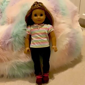 I am selling a used American girl doll and it is in good shape
